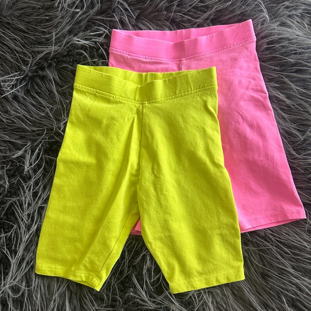 NWOT Kids bike shorts in neon pink and yellow/green
